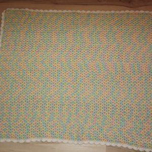 Hand crafted knitted baby blanket soft pink, blue and yellow